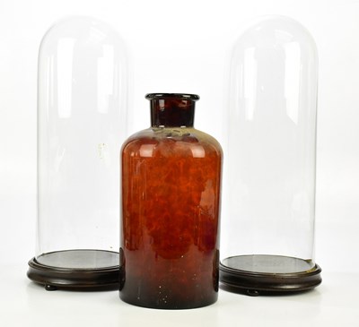 Lot 1563 - A pair of Victorian style glass domes on...