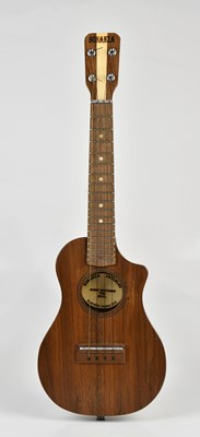Lot 1551 - BONANZA; a cased ukulele, build no. 296, dated...