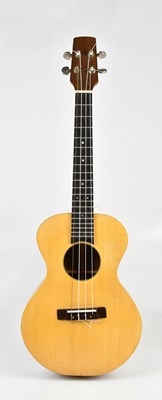 Lot 1608 - An unnamed baritone ukulele, with soft case.