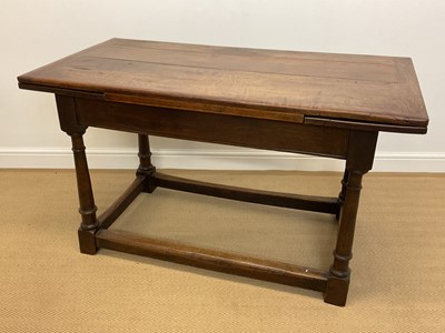 Lot 471 - An oak draw-leaf plank top refectory type...
