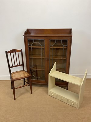 Lot 585 - An oak leaded glazed two door display...