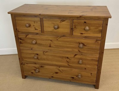 Lot 511 - A pine chest of three short over three long...