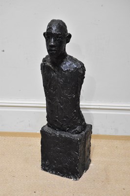 Lot 1706 - A large black painted plaster bust of a bald...