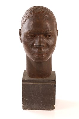 Lot 1711 - A maquette bust of a gentleman on square...