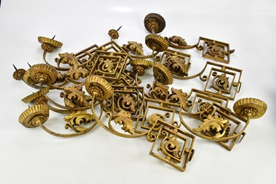 Lot 1721 - A collection of gilt metal arms from a...