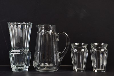 Lot 2553 - BACCARAT; a French crystal jug and two...