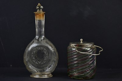 Lot 2557 - A blown glass decanter with etched and faceted...