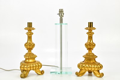 Lot 1800 - A pair of gilt wood altar candlesticks, height...