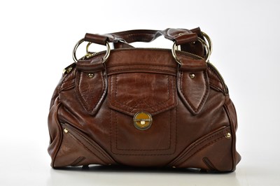 Lot 763 - MARC JACOBS; a brown thick leather bowling bag...