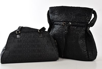 Lot 765 - MOSCHINO; a black canvas monogram handbag with...