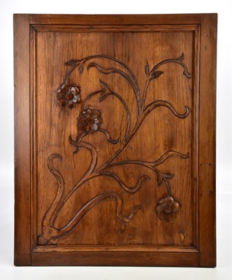 Lot 1565 - An Art Nouveau style carved stained pine panel...