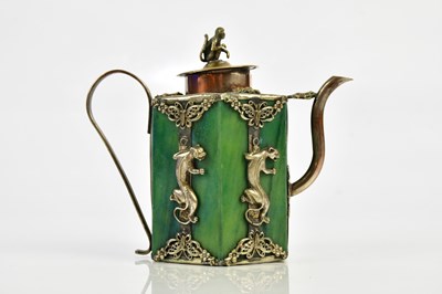 Lot 2514 - A Chinese white metal mounted green hardstone...