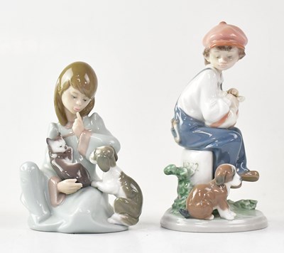 Lot 238 - LLADRÓ; two figure groups of children with...
