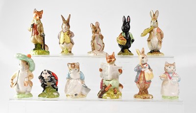 Lot 279 - BEATRIX POTTER; eleven Royal Albert figures,...