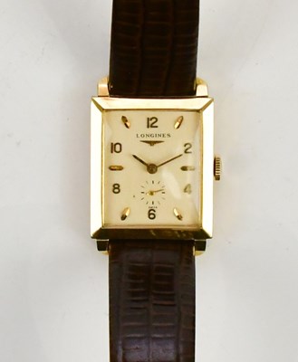 Lot 603 - LONGINES; a gentleman's tank shaped 14ct gold...