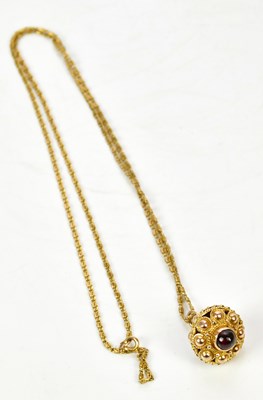Lot 263 - A 9ct yellow gold pierced red stone set...