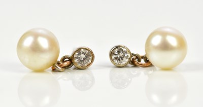 Lot 321 - A pair of white metal pearl and diamond...
