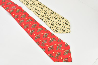 Lot 821 - HERMÈS; two 100% silk ties including a red tie...