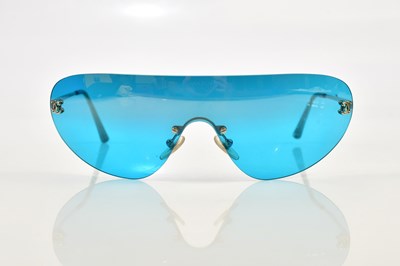 Lot 826 - CHANEL; a pair of cased lady's sunglasses with...