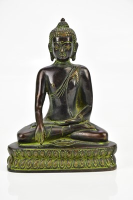 Lot 2709 - A Chinese bronze figure of a seated Buddha,...