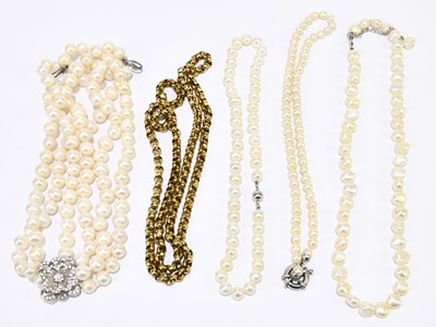 Lot 1351 - A three row cultured pearl choker necklace on...