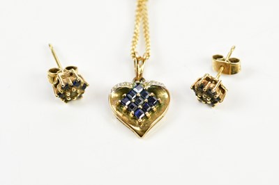 Lot 265 - A 9ct yellow gold heart shaped pendant on...
