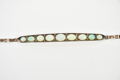 Lot 443 - A yellow and white metal bracelet set with...
