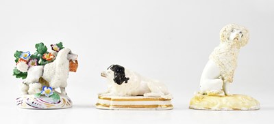 Lot 479 - A Chelsea porcelain model of a poodle with a...