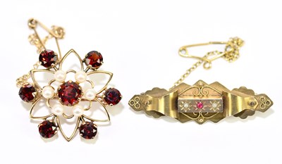 Lot 1451 - A 9ct yellow gold seed pearl and garnet brooch,...