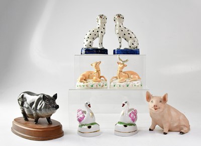 Lot 480 - A collection of porcelain and pottery animals...