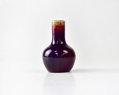 Lot 622 - A small Chinese sang de boeuf style vase with...