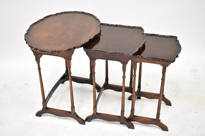 Lot 32 - An Edwardian mahogany nest of tables, each...