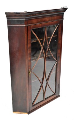 Lot 43 - An Edwardian inlaid mahogany glazed corner...