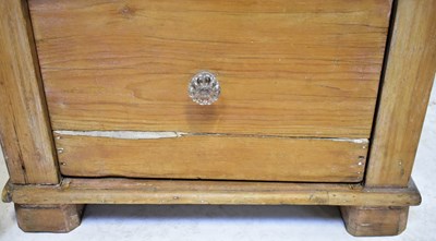 Lot 40 - A pair of Victorian pine bedside three-drawer...