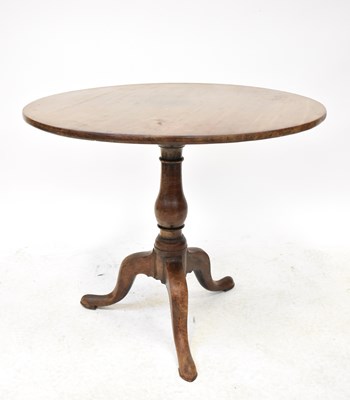Lot 23 - A 19th century mahogany circular tilt-top...