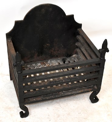 Lot 1423 - A cast iron fire grate, height 47cm, width...