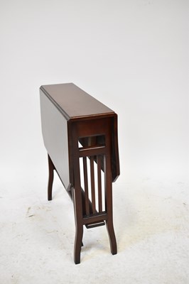Lot 16 - An Edwardian mahogany Sutherland table with...