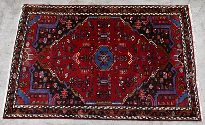 Lot 1440 - A contemporary decorative rug, decorated with...