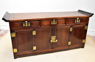 Lot 1170 - A Chinese rosewood sideboard with three...