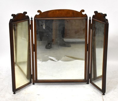 Lot 1464 - A figured walnut triple plate dressing table...