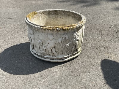 Lot 1268 - A modern reconstituted stone circular planter...
