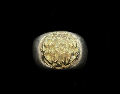 Lot 1372 - FOLLI FOLLIE; a silver and yellow metal domed...
