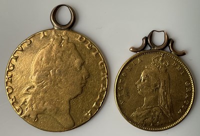 Lot 338 - A gold 1798 guinea with soldered ring loop...