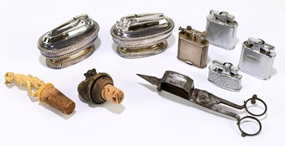 Lot 92 - DUNHILL; a George V hallmarked silver lighter,...