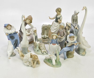 Lot 2811 - NAO; a group of ten figures including swans,...