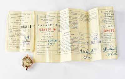Lot 1345 - A Soviet hallmarked 14k gold wristwatch,...