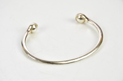 Lot 416 - GEORG JENSEN; a silver torque bangle designed...