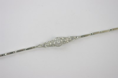 Lot 417 - An 18ct white gold and diamond bracelet with...