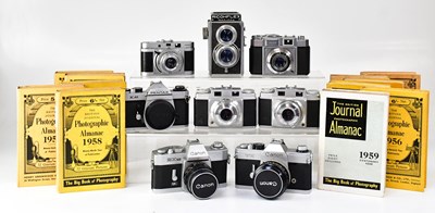 Lot 407 - A collection of cameras to include a Ricohflex...