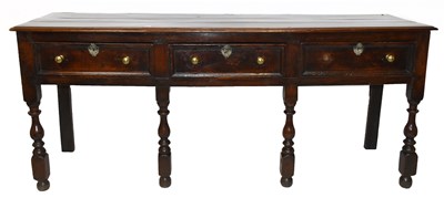 Lot 1478 - An 18th century oak dresser base, with three...